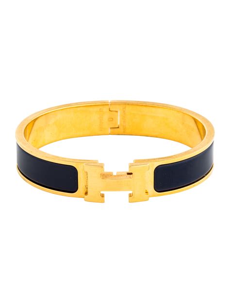 Mens hermes bracelet - Narrow bracelet in enamel with gold-plated hardware. Made in France. Wrist size: 17 cm | Width: 12 mm. Enamel is a delicate material composed from glass, quartz, clay and slate. We recommend to: • Clean jewelry using a chamois or soft cloth to restore luster. • Protect jewelry from shocks and scratches. • Store jewelry in its original …
